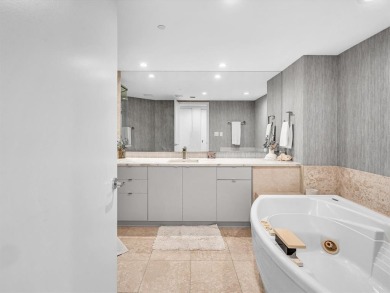 Experience luxury oceanfront living in this renovated 2-bedroom