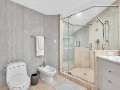 Experience luxury oceanfront living in this renovated 2-bedroom