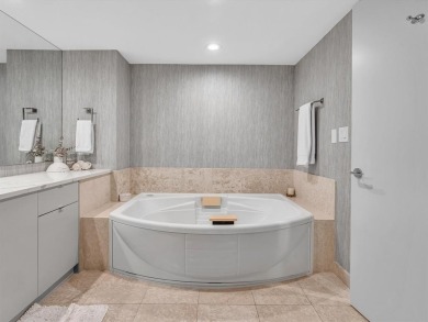 Experience luxury oceanfront living in this renovated 2-bedroom