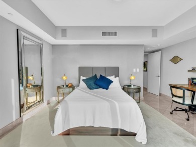 Experience luxury oceanfront living in this renovated 2-bedroom