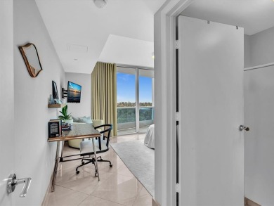 Experience luxury oceanfront living in this renovated 2-bedroom