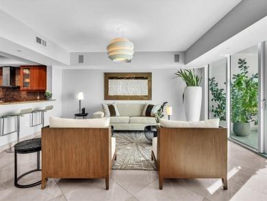 Experience luxury oceanfront living in this renovated 2-bedroom