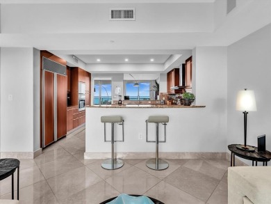 Experience luxury oceanfront living in this renovated 2-bedroom
