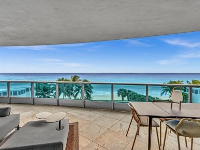 Experience luxury oceanfront living in this renovated 2-bedroom