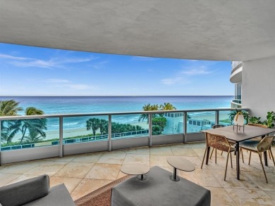 Experience luxury oceanfront living in this renovated 2-bedroom