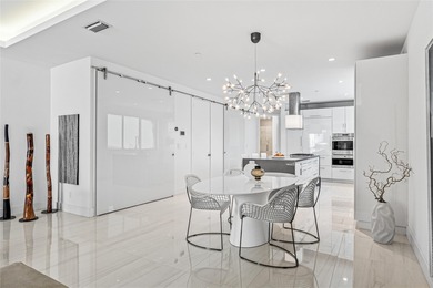 Coastal charm meets elevated elegance at this four-level, modern