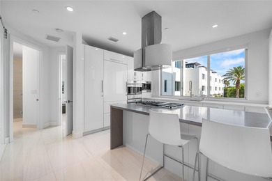 Coastal charm meets elevated elegance at this four-level, modern