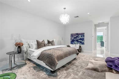 Coastal charm meets elevated elegance at this four-level, modern