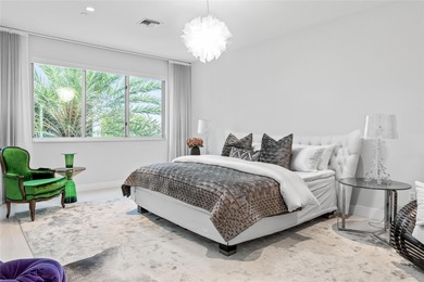 Coastal charm meets elevated elegance at this four-level, modern