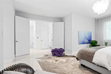 Coastal charm meets elevated elegance at this four-level, modern