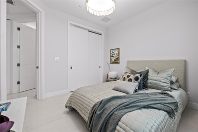 Coastal charm meets elevated elegance at this four-level, modern