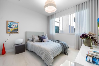 Coastal charm meets elevated elegance at this four-level, modern