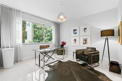 Coastal charm meets elevated elegance at this four-level, modern