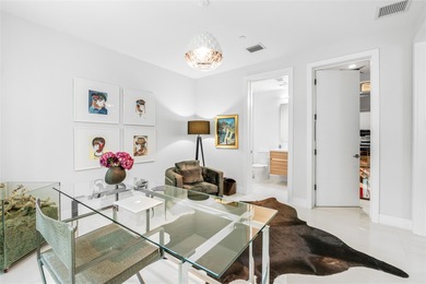 Coastal charm meets elevated elegance at this four-level, modern