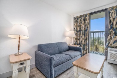 This updated 1-bedroom direct oceanfront condo in the Pinnacle