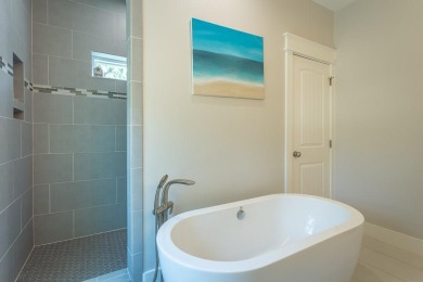 Welcome to your private coastal retreat--this custom-built