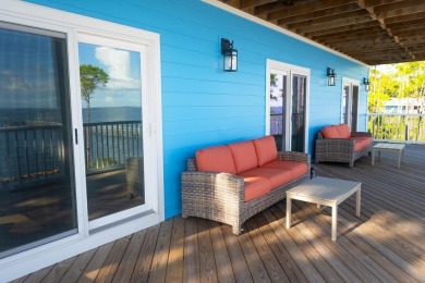 Welcome to your private coastal retreat--this custom-built