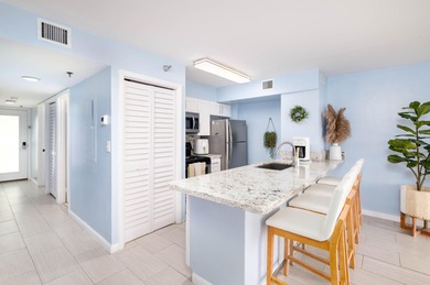 Professionally remodeled and fully furnished, this stunning unit