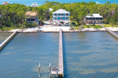 Welcome to your private coastal retreat--this custom-built