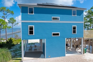 Welcome to your private coastal retreat--this custom-built