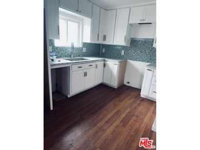 Nestled on a quiet private street near a peaceful greenbelt