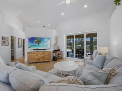 Discover this beautiful waterfront pool home, just minutes from