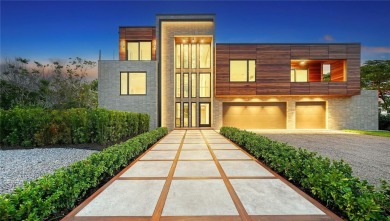 Discover unparalleled modern living at this custom contemporary