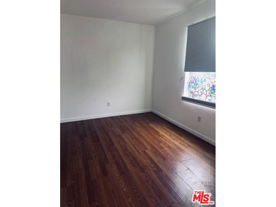 Nestled on a quiet private street near a peaceful greenbelt