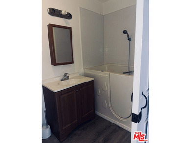 Nestled on a quiet private street near a peaceful greenbelt