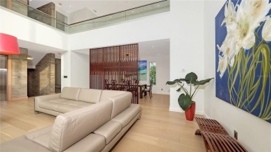 Discover unparalleled modern living at this custom contemporary