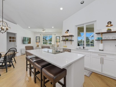 Discover this beautiful waterfront pool home, just minutes from