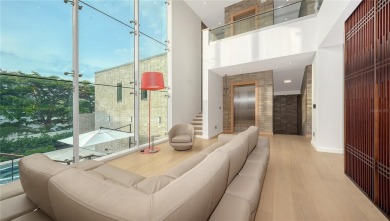 Discover unparalleled modern living at this custom contemporary