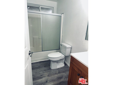 Nestled on a quiet private street near a peaceful greenbelt