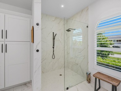 Discover this beautiful waterfront pool home, just minutes from