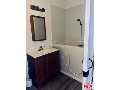 Nestled on a quiet private street near a peaceful greenbelt