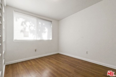 Nestled on a quiet private street near a peaceful greenbelt