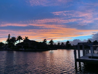 Discover this beautiful waterfront pool home, just minutes from