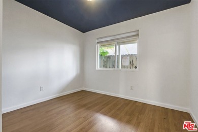 Nestled on a quiet private street near a peaceful greenbelt