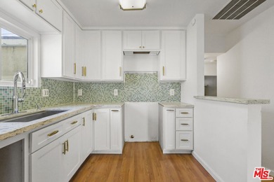 Nestled on a quiet private street near a peaceful greenbelt