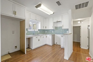 Nestled on a quiet private street near a peaceful greenbelt