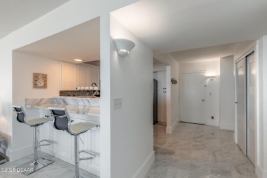 Experience elevated coastal living in this beautifully appointed