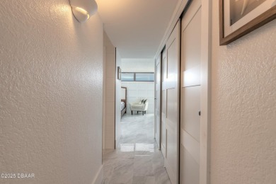 Experience elevated coastal living in this beautifully appointed