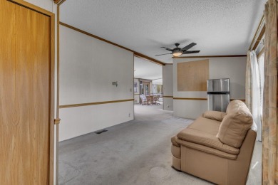 Privacy abounds at this spacious ranch-style home set on 10