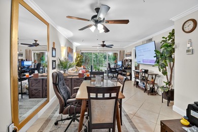 Welcome to waterfront living at sun-swept Unit 203 in