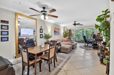 Welcome to waterfront living at sun-swept Unit 203 in