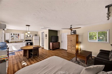 Discover a rare investment opportunity with two charming homes