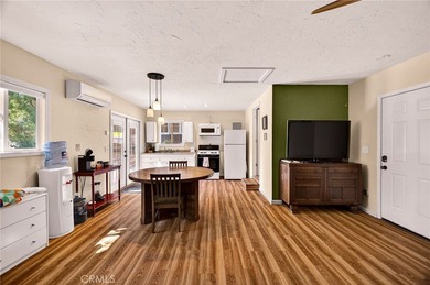 Discover a rare investment opportunity with two charming homes