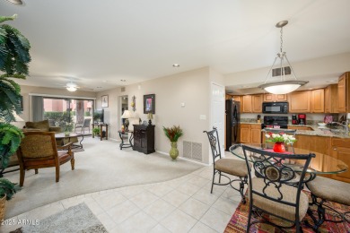 This updated, perfectly situated condo in the desirable Paradise