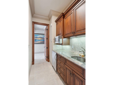 Experience the epitome of Marco Island living in this