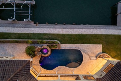 Experience the epitome of Marco Island living in this